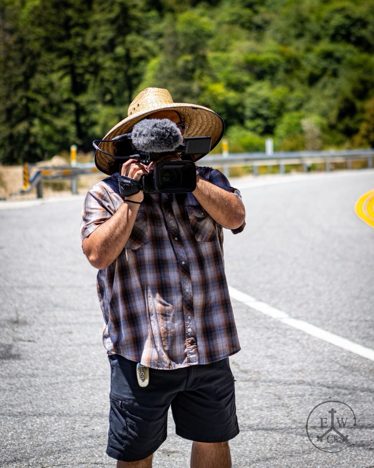 Jeremiah, founder of PR6J5CT, filming riders on a Southern California canyon road